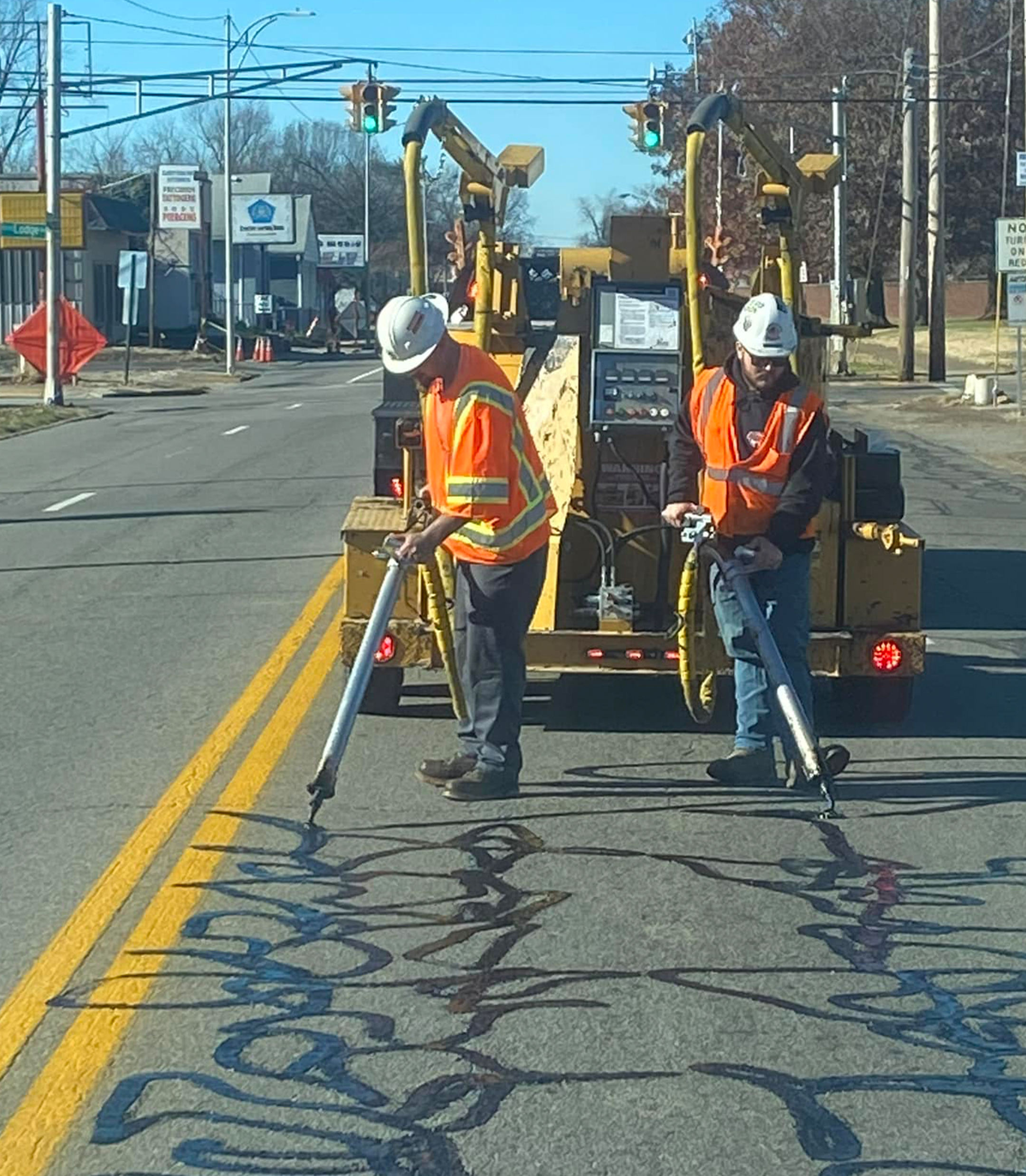 Asphalt Sealcoating Road