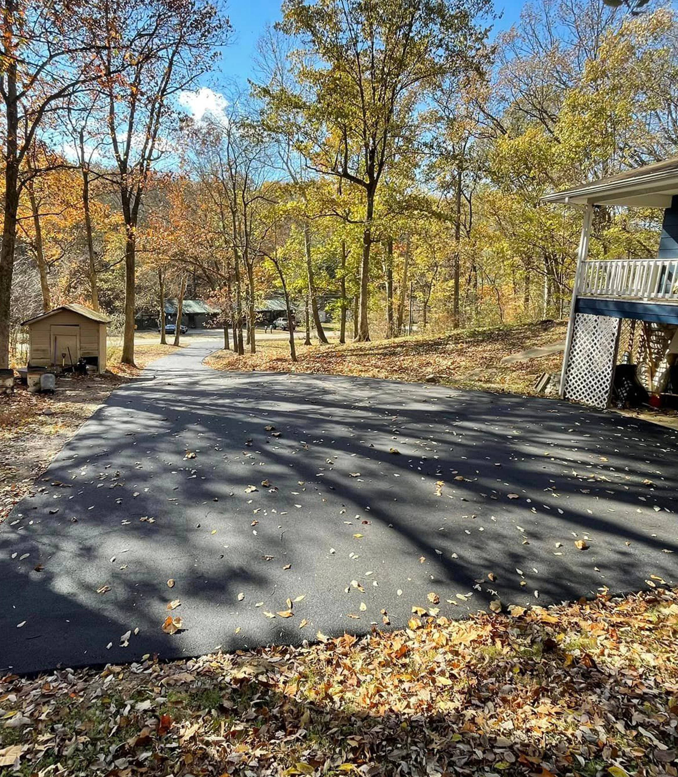 Residential Asphalt Parking Lot Shed