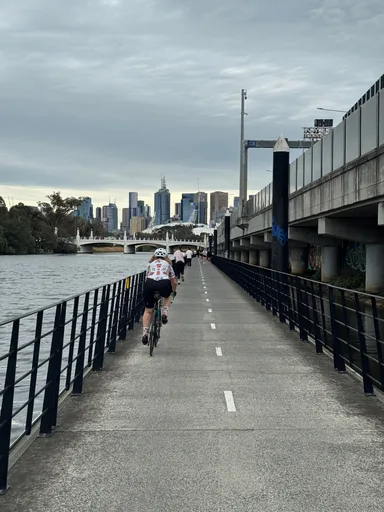 Cycling beside the Yarra with Melbourne skyline views