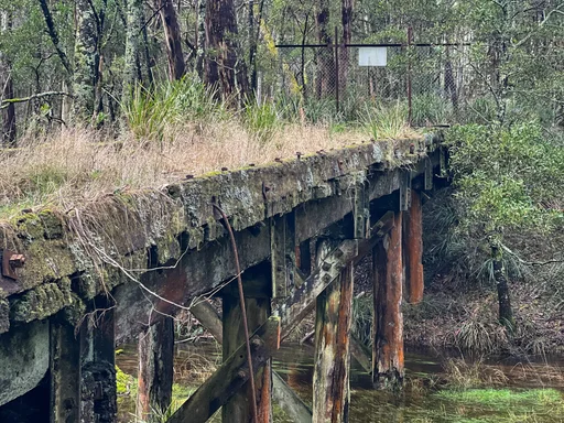 Historic Coliban railway bridge near Lyonville, photographed in 2022. Use the signed bypass, not the unsafe old bridge. Photo: Vince Masci / BikeRoutes. Capture GPS unavailable; gallery only.