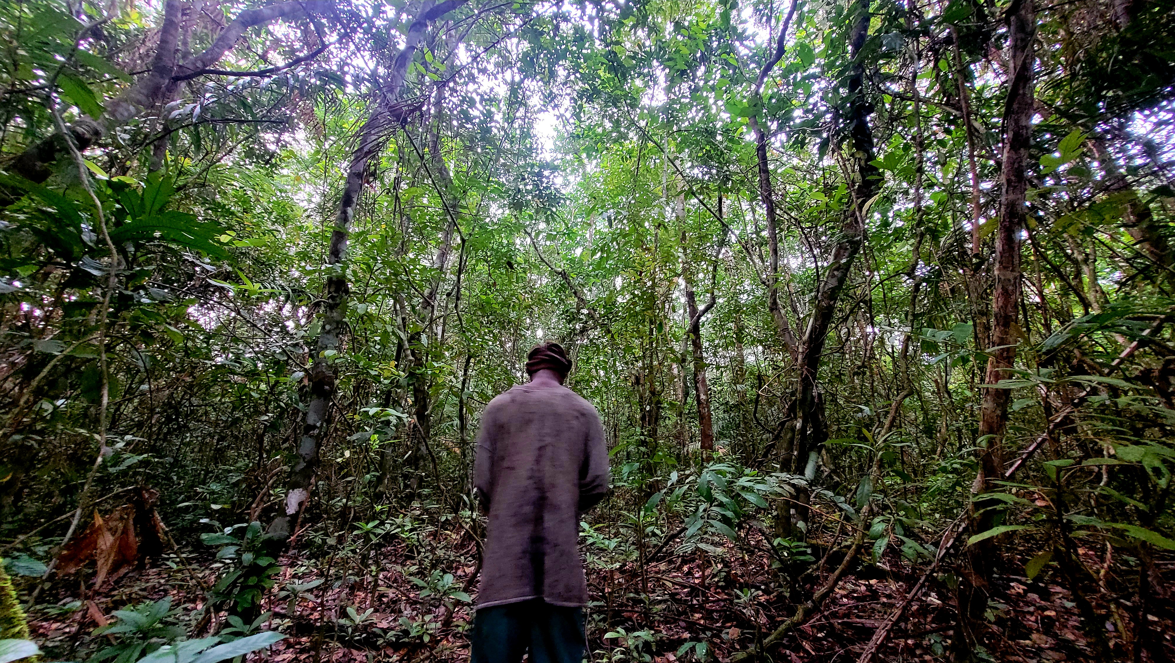 A local hunter, guiding me through the Rainforest