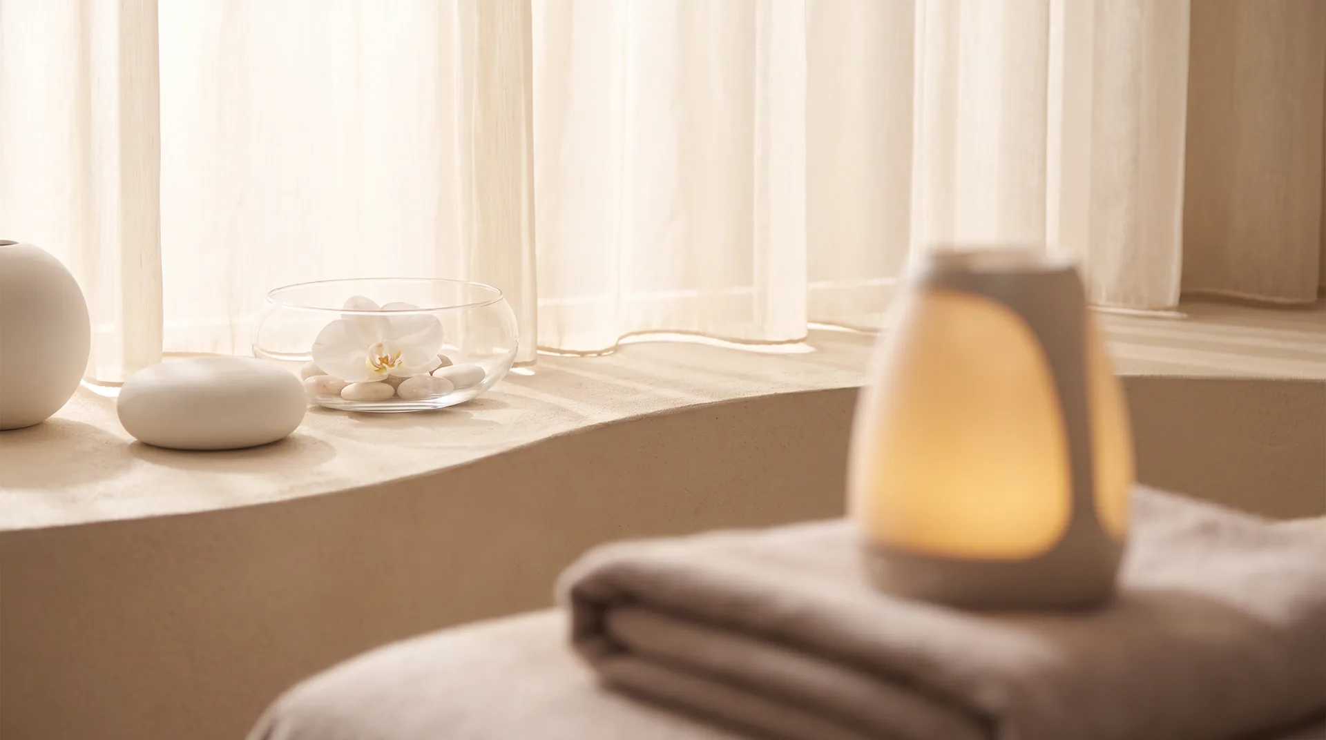 Provider performing an Exilis monopolar radiofrequency skin tightening treatment at Premier Med Spa of Lake Oswego