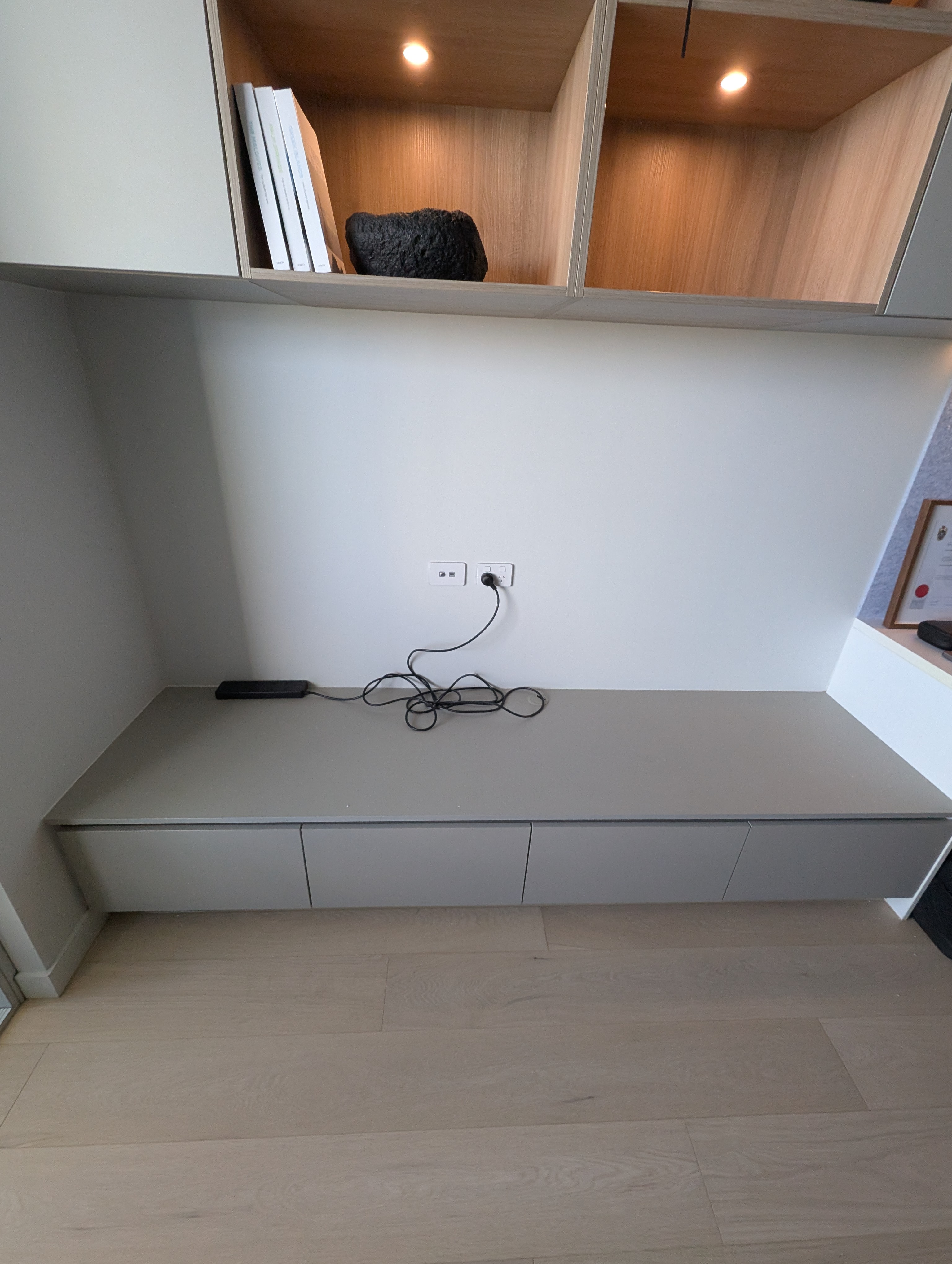 Sleek 76-inch TV Wall Mount in Logan Reserve: Custom Cabinetry Setup — Dead Level TV Installation, Logan Reserve