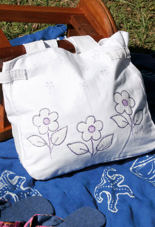 Bolsa florida com découpage