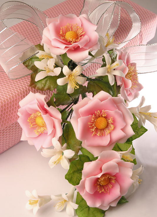 Arranjo de flores de biscuit