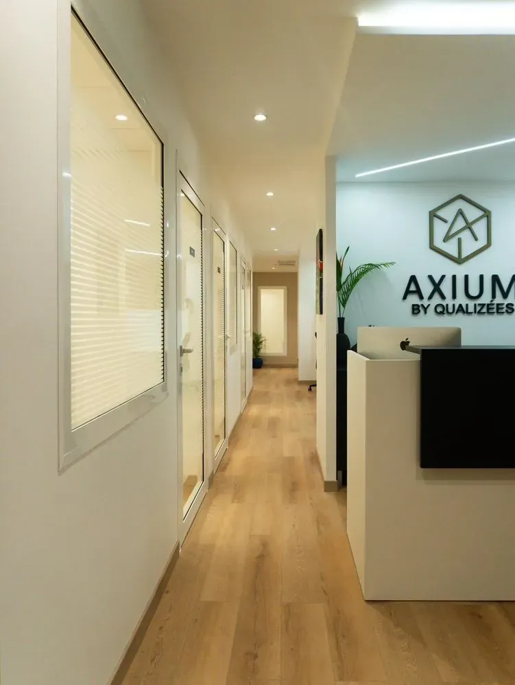 AXIUM BY QUALIZEES