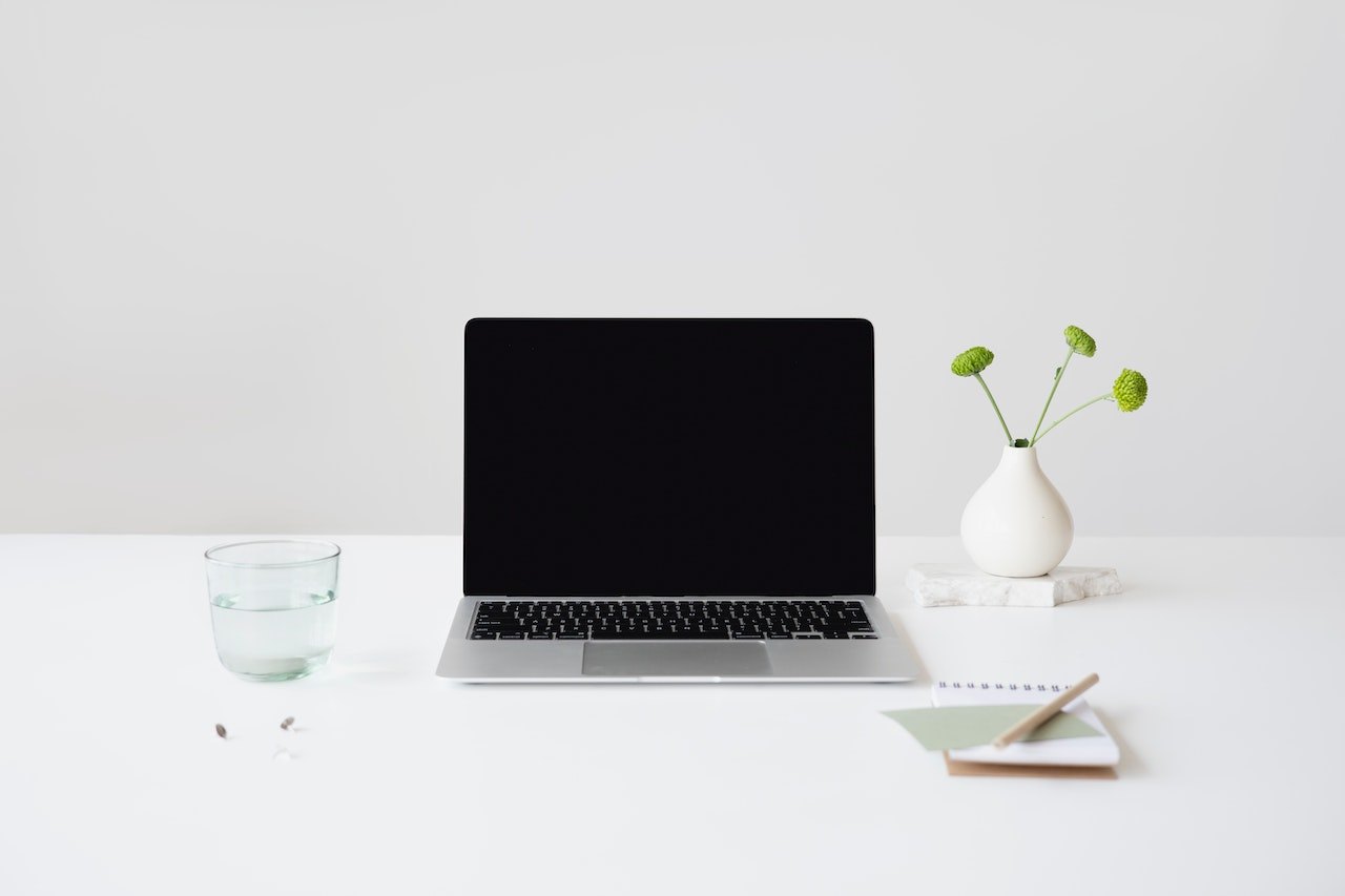 Photo by Anna Nekrashevich: https://www.pexels.com/photo/a-laptop-near-the-drinking-glass-and-plant-on-the-table-8534387/