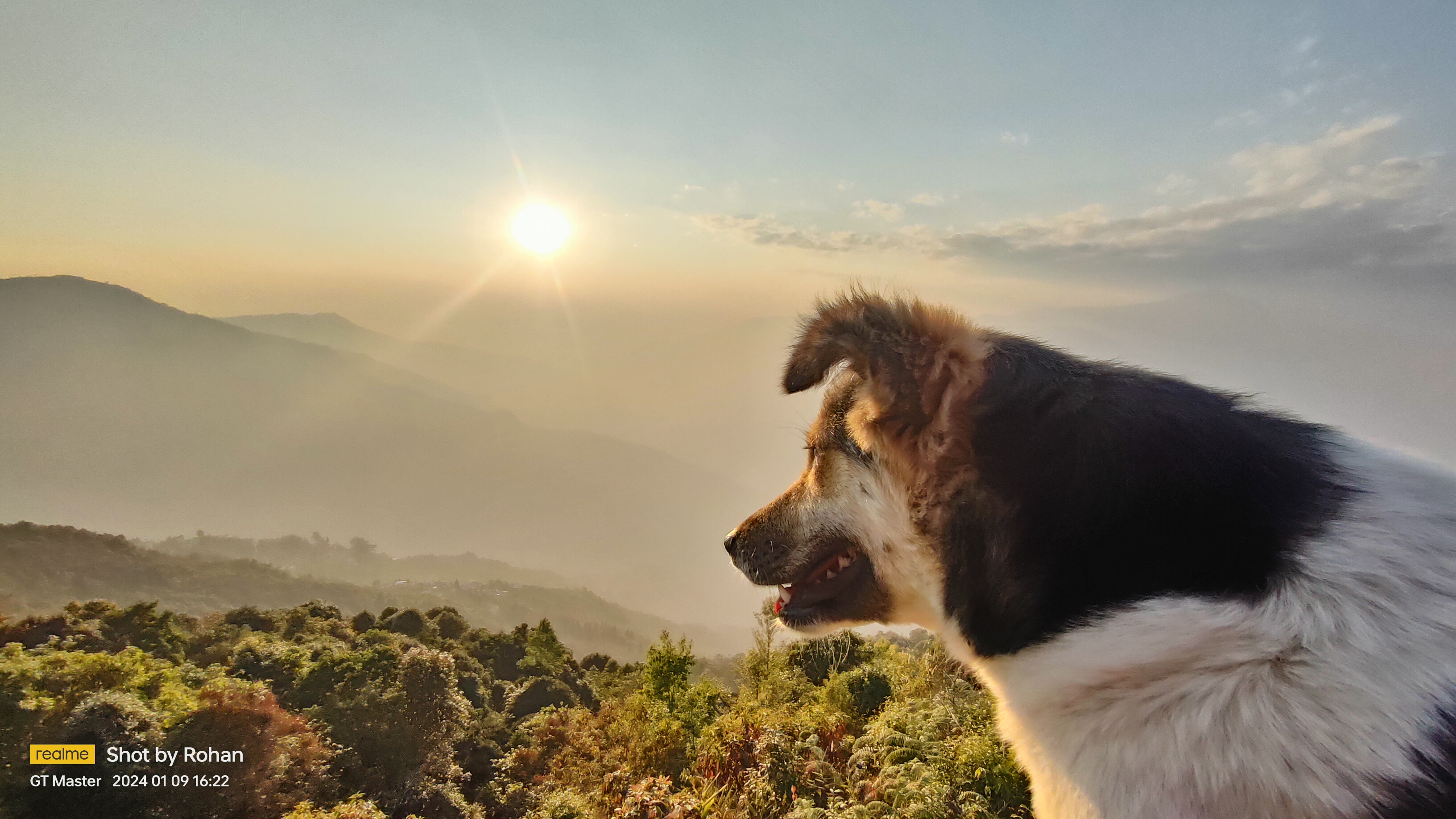 "Our tourist guide in front of Kanchanjungha". Taken from Ramitey View Point, Sillerygaon