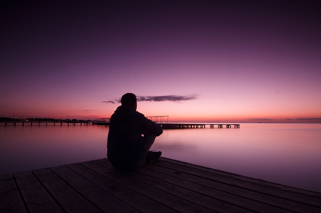 alone-man-near-lake