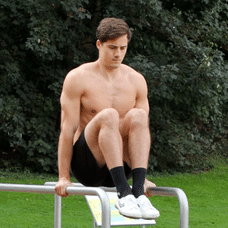 Knee Raises on parallel bars