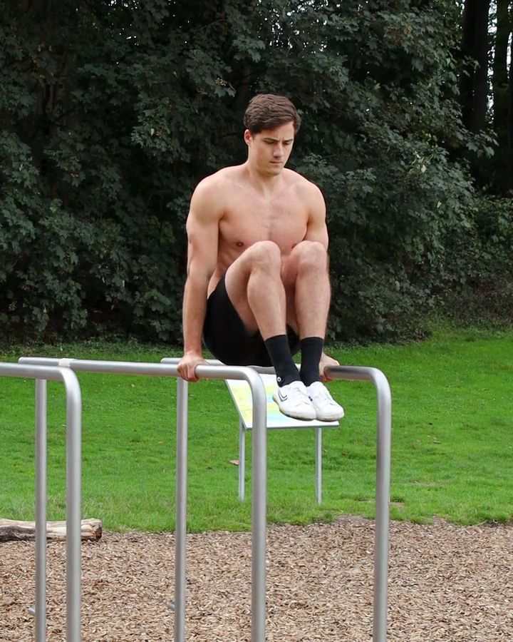 Knee Raises on parallel bars