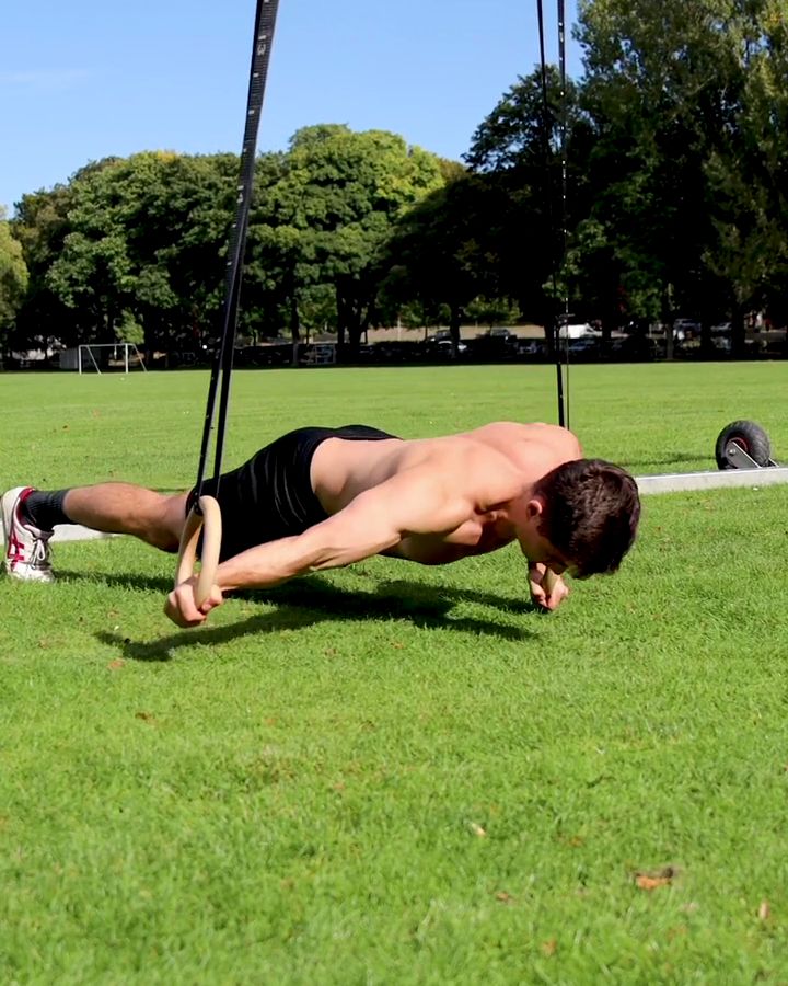 Archer Push Ups with gym rings