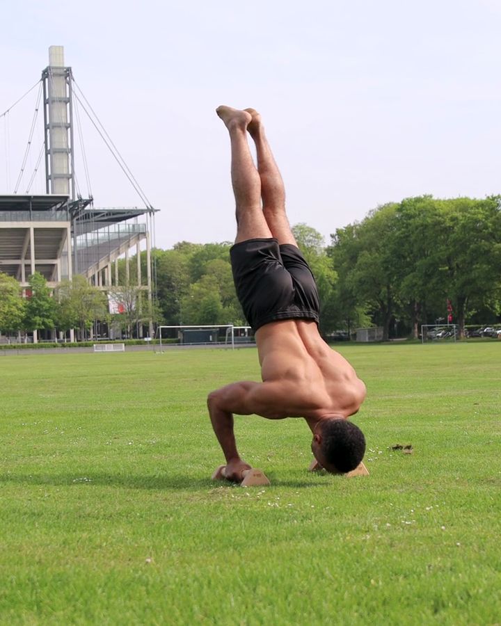 Handstand Push Ups with parallettes