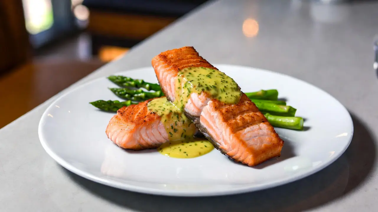 Pan-Seared Salmon with Lemon-Dill Sauce and Asparagus, plated dish