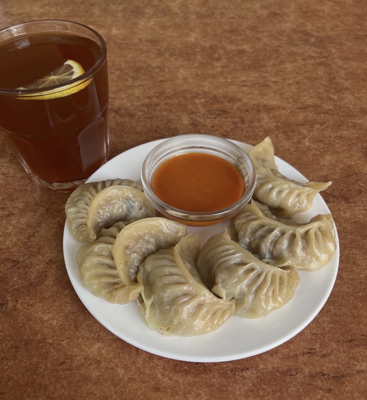 Steamed Momo with Iced Tea