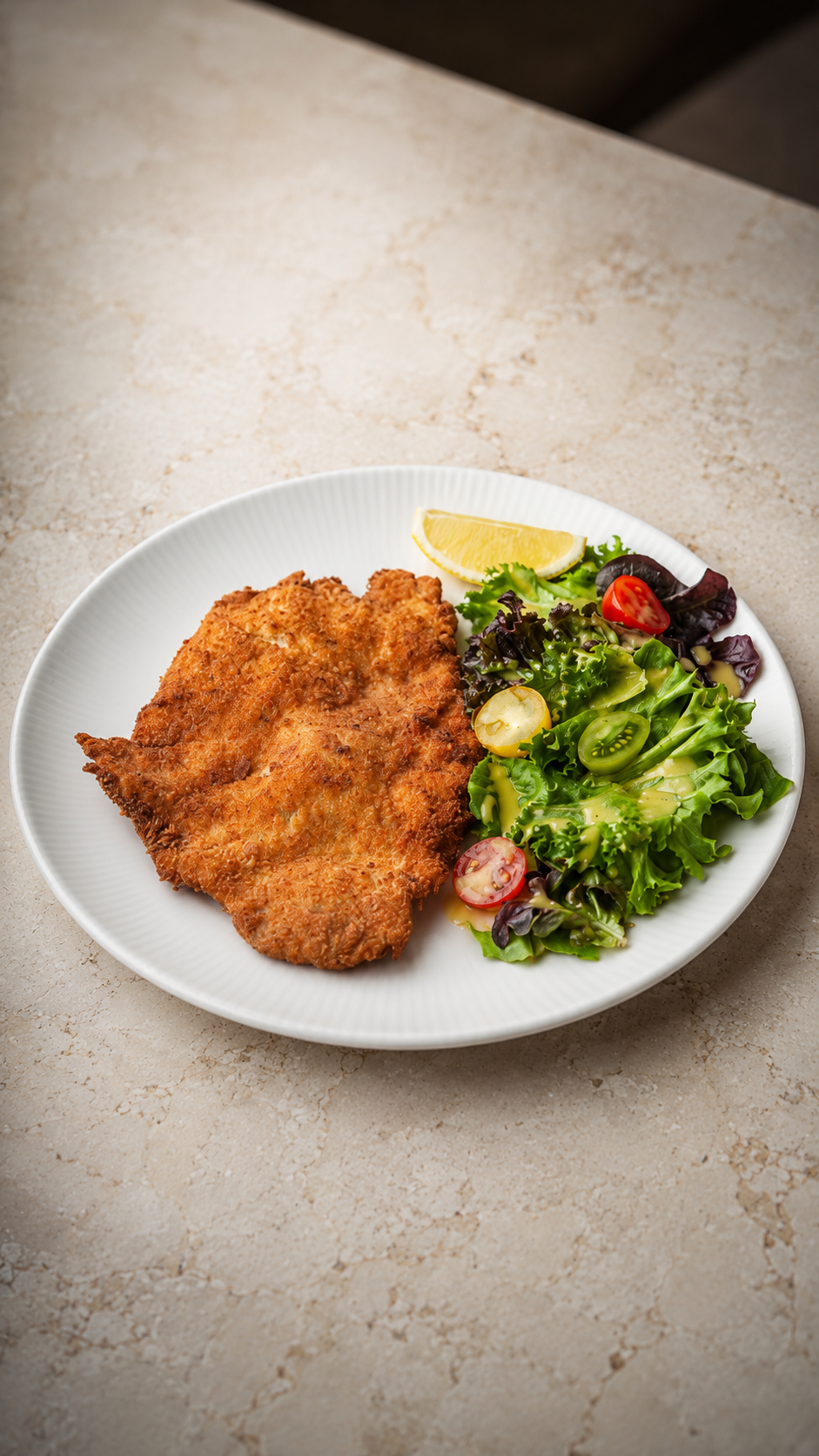 Small Schnitzel with salad