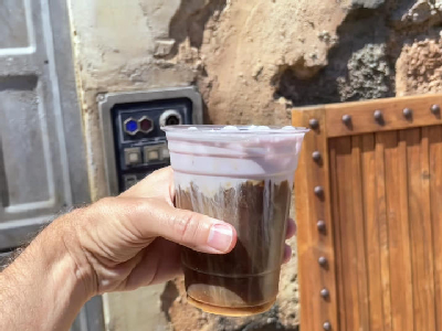 cold brew black caf with taro topper — photo from a ParkEats review