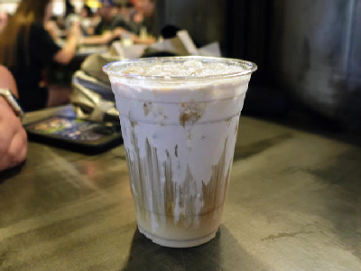 cold brew black caf with taro topper — photo from a ParkEats review