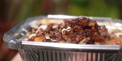 Maple Bacon Cinnamon Roll — photo from a ParkEats review