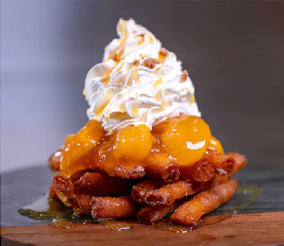 Peaches and Cream Funnel Cake Fries  — photo from a ParkEats review