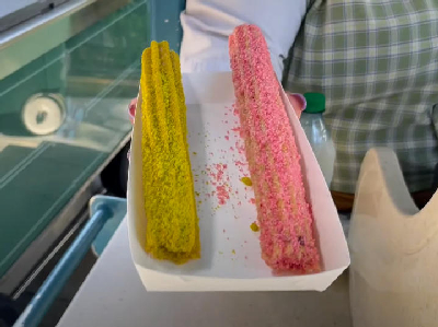 Pistachio-Cherry Churro — photo from a ParkEats review