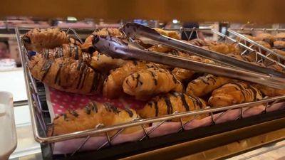 Variety of Muffins, Croissants, Danish, and Fruit