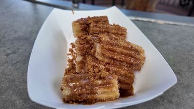 Cookie Butter Mini Churros — photo from a ParkEats review