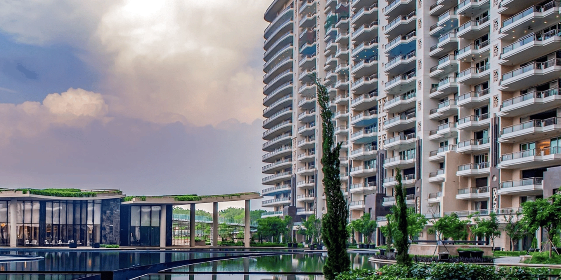 DLF The Westpark — towers above a landscaped pool pavilion