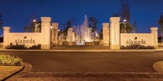 DLF Alameda — entrance gate lit at night