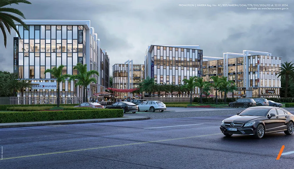 DLF Garden City Central — shop-cum-office blocks along the main road