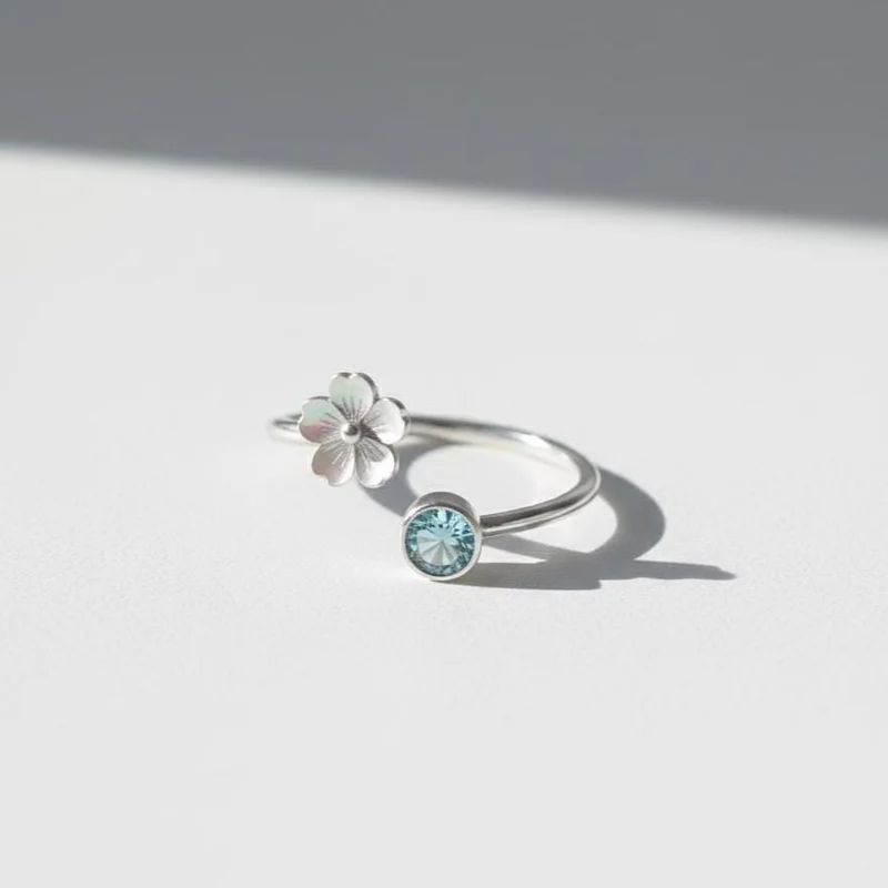 Floral Silver Ring with Blue Stone