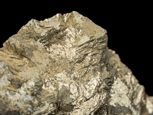 a close up of a rock with a black background