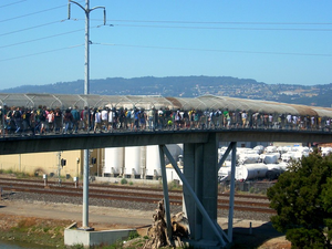 Fans leaving Oakland Athletics game to catch a train