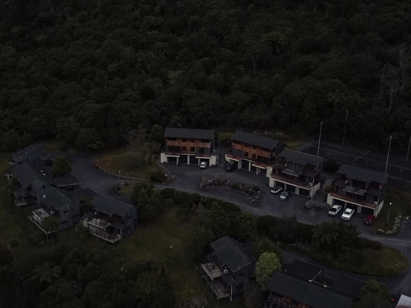 An aerial view of a parking lot at night
