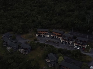An aerial view of a parking lot at night
