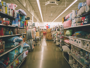 assorted items on white wooden shelf
