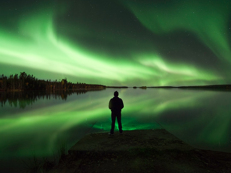 After a long day, we all need a moment to unwind and recharge. What better way to do that than by stepping back and taking in the beauty of the northern lights in northern Saskatchewan? As the vibrant colors of green, pink, and purple dance across the sky, you'll feel your worries melt away and your spirit rejuvenated. This natural wonder is a reminder of the incredible power and beauty of our planet, and a chance to reconnect with nature in its purest form. So take a deep breath, let go of your stress, and immerse yourself in the magic of the northern lights in northern Saskatchewan.