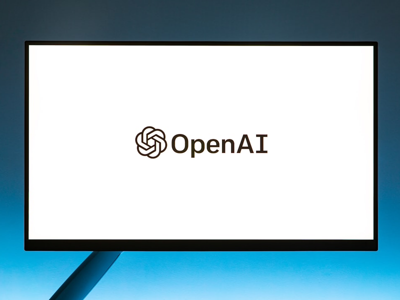 a computer screen with the open ai logo on it