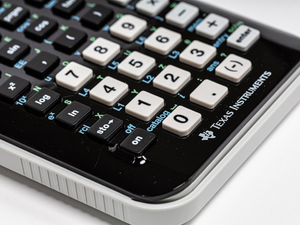 black and white Texas Instruments calculator