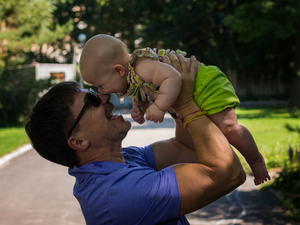 a person holding a baby