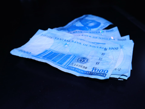 a bunch of money sitting on top of a table