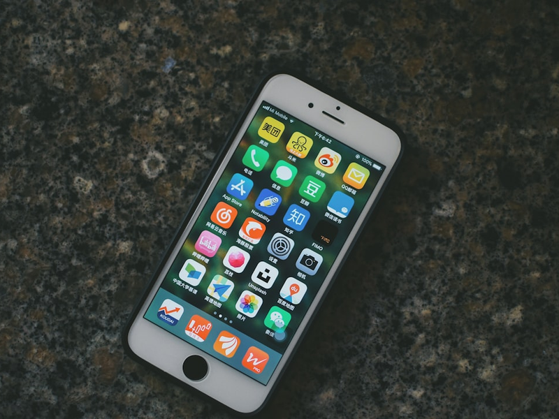 space gray iPhone 6 turned on on marble surface