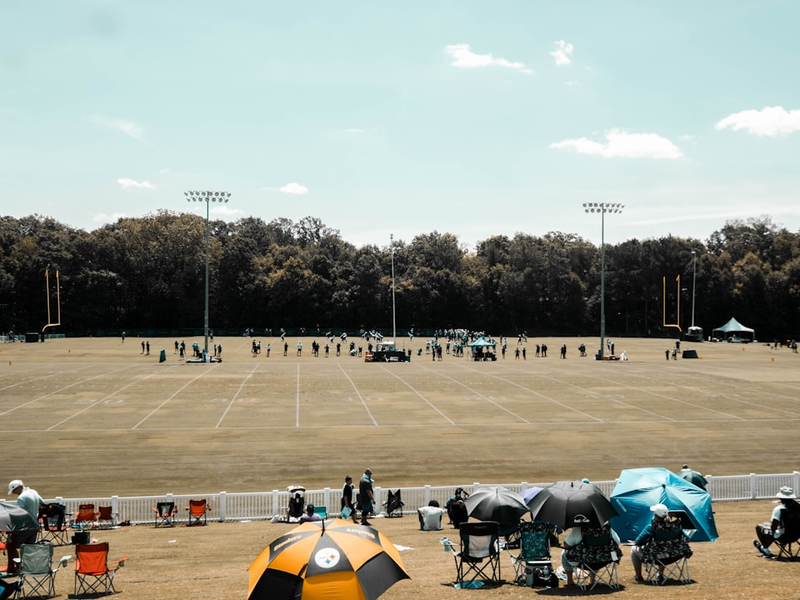 a group of people at a race track