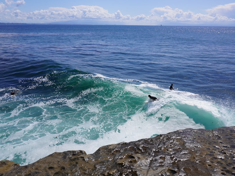 sea,water,ocean,wave,waves,surf,nature,beach,coast,splash,foam,summer,storm,blue,danger,spray,power,sky,big,holiday,tide,tropical,coastline,landscape,shore,surfer