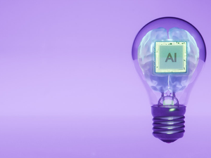 Conceptual render of artificial intelligence processor chip embedded in a white human brain inside a transparent light bulb, floating against blue purple gradient background with copy space