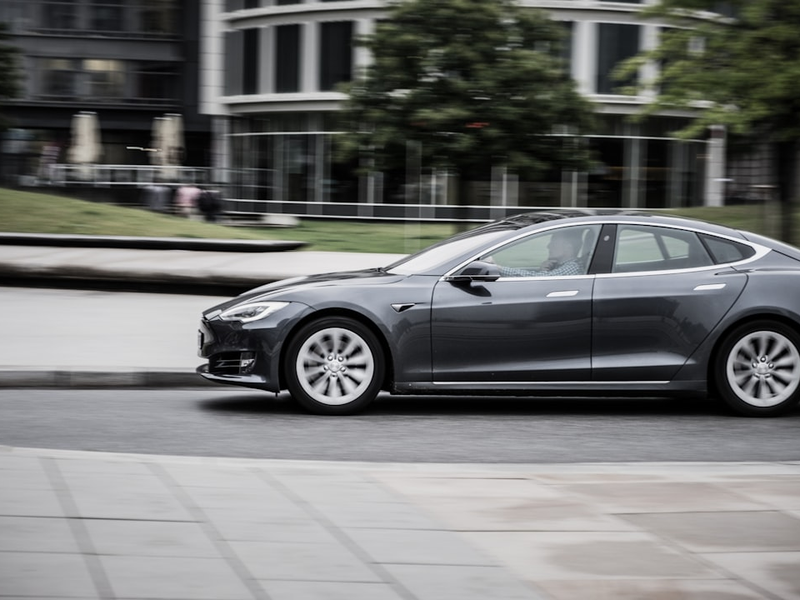 panning photography of sedan