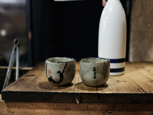 a couple of cups on a table