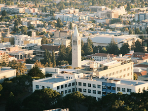 An aerial view of a city with a clock tower