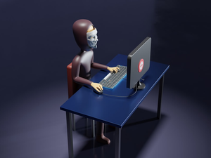 a skeleton sitting at a desk with a laptop and keyboard