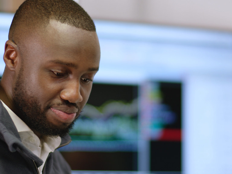 Male mechanical engineer designs electric vehicles